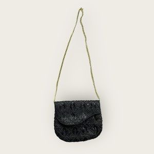 Vintage black beaded purse with gold chain.